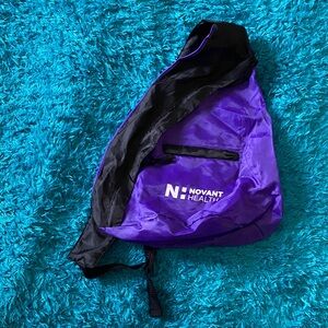Novant Health Purple and black Sling Bag